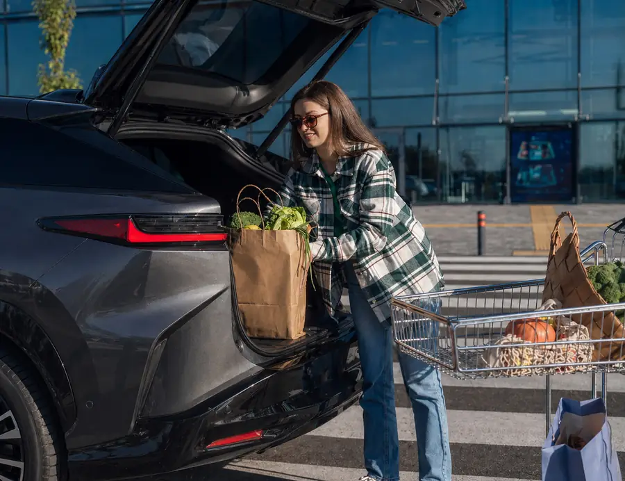 Loading groceries into the Lexus RZ 450e